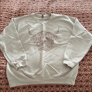 Women’s Cream Pullover with Highland Cow Design
